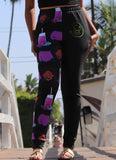 Woman wearing cute black vegan jogger sweatpants with graphic