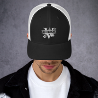 Young man wearing an Ethi-Cali black and white vegan trucker hat